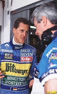 Symonds talks to Michael Schumacher in 1995