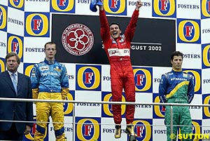 Winner Giorgio Pantano jumps for joy!
