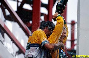 Schumacher celebrates his first GP win in 1992