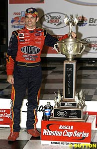 Winner Jeff Gordon with a big winner's trophy