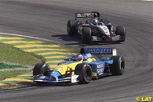 Jarno Trulli ahead of David Coulthard