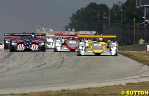 The cars head into the first turn at Road America