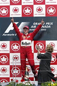 Michael Schumacher celebrates his win