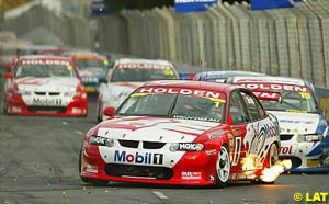 Mark Skaife shows the field the way between the concrete walls