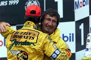 Frentzen celebrates victory at the 1999 French GP with Eddie Jordan