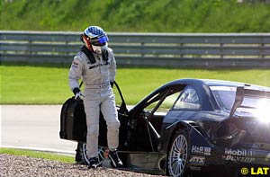 Jean Alesi abandons his damaged Mercedes