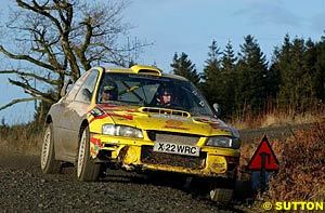 Finn Mikko Hirvonen competing in last month's Rally of Great Britain in a Subaru Impreza, who is driving for Ford in 2003