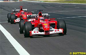 Barrichello winning ahead of Schumacher