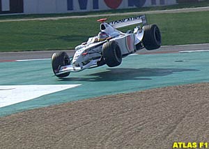 Jacques Villeneuve flies over the kerbs