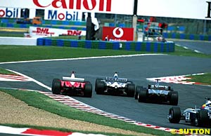 Montoya fights to keep Schumacher and Raikkonen behind