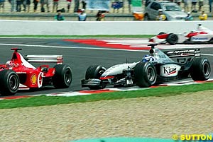 Schumacher overtakes Raikkonen
