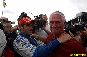 Winner Dario Franchitti with Ric Moore, Greg Moore's father