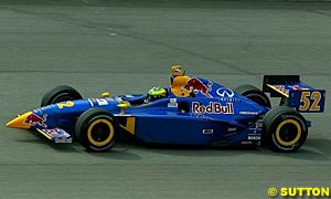 Tomas Scheckter on his way to victory at Michigan