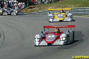 The #1 Audi leads the #2 Audi before Pirro's accident
