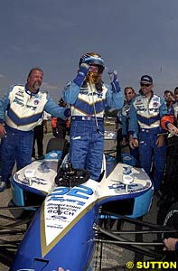 Patrick Carpentier celebrates his second win of 2002