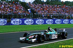 Eddie Irvine returned to the podium with the Jaguar