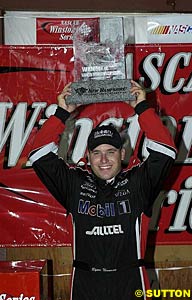 Winner Ryan Newman with his trophy for his first Winston Cup victory