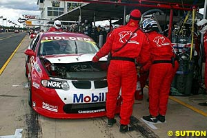 A rare sight as the bonnet closes on the wounded HRT Commodore of Mark Skaife and Jason Bright