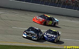 Mark Martin collides with Jimmie Johnson a lap before the start of the race