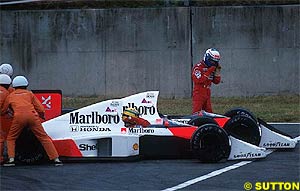 Senna and Prost after clashing at Suzuka in 1989
