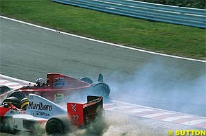 Senna crashses into Prost at the start of the 1990 race