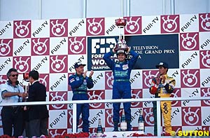 Suzuki on the podium, 1990