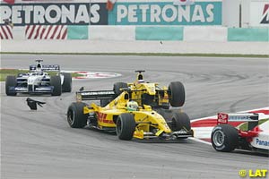 Sato crashes into teammate Fisichella