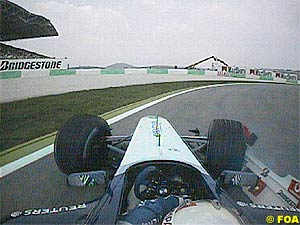 Montoya runs wide after clashing with Schumacher