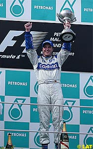 Ralf Schumacher celebrates his win