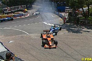 Massa pushes Bernoldi off the track