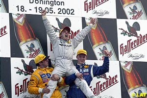 Winner Jean Alesi shares his joy on the shoulders of second placed Christian Abt and third placed Mattias Ekstrom