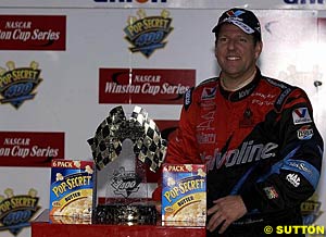 Johnny Benson celebrates his first Winston Cup win