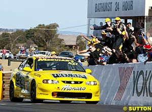 The GRM team on the pit wall to welcome the victorious Monaro home