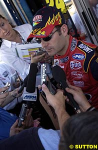 1995, 1997, 1998 and 2001 NASCAR Winston Cup champion Jeff Gordon talking to the media this year, something Tony Stewart is going to have to get more used to in 2003