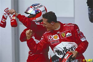 Schumacher celebrates his win at Imola