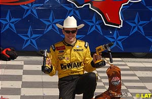 Matt Kenseth's celebrates his win with some of his sponsor's product