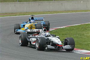 David Coulthard ahead of Jarno Trulli