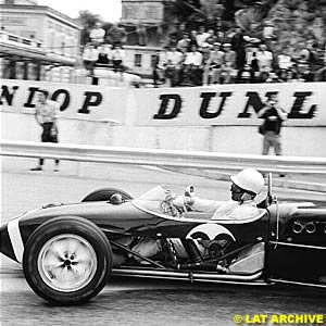 Stirling Moss driving the Rob Walker Lotus 18-Climax, at the 1961 Monaco GP