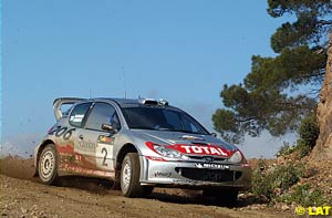 Marcus Gronholm throws up the gravel