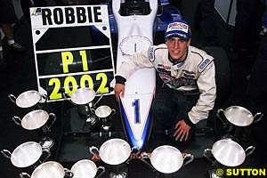 2002 British F3 Champion Robbie Kerr with his trophies