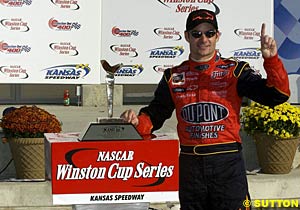 Kansas winner Jeff Gordon and his winner's trophy