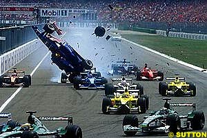 Luciano Burti crashes at the start of the 2001 German GP