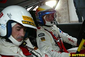 Co-driver Marc Marti, left, with Carlos Sainz, second after a penalty on Leg Two