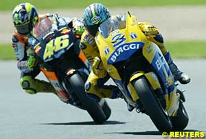 Max Biaggi leads Valentino Rossi during the first half of the race