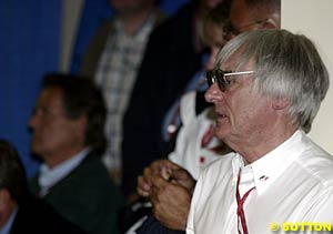 Ecclestone watches the press conference