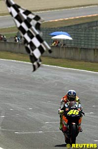 Winner Valentino Rossi takes the win in Italy