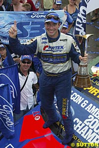 Marcos Ambrose celebrates becoming 2003 V8 Supercar Champion