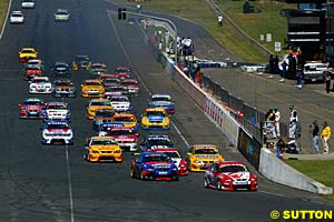The start of race one, with Mark Skaife leading Marcos Ambrose