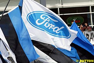 Ford flags wave after the manufacturer's win in Finland this year
