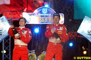Swedish rally victors Timo Rautiainen and Marcus Gronholm celebrate